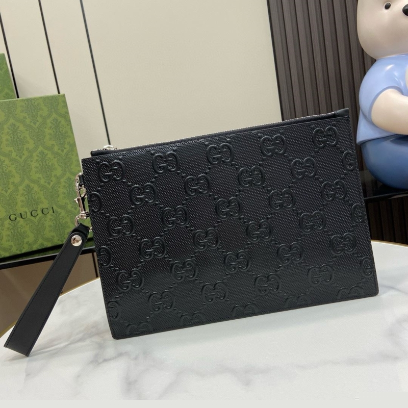 G*u*i clutch bags